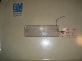 5952907 OLDSMOBILE Starfire Lh Parking Light Lens Nos