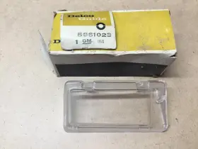 5961023 OLDSMOBILE Nos Delta Left Outer Parking Lamp Lens Gm