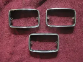 3403410 PLYMOUTH Duster Parking Light Bezels Lh Rh