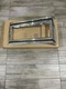 NOS GM OLDSMOBILE DELTA 88 ROYALE REGENCY 98 HEADLIGHT MARKER TRIM BEZEL LEFT