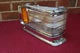 75 76 CADILLAC DEVILLE FLEETWOOD CALAIS NOS RH GM CORNERING LAMP & CHROME BEZEL